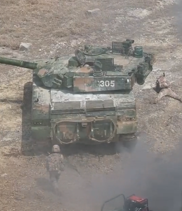 A PLAA 35th HCAB Type-96A main battle tank equipped with a GL-6 active protection system